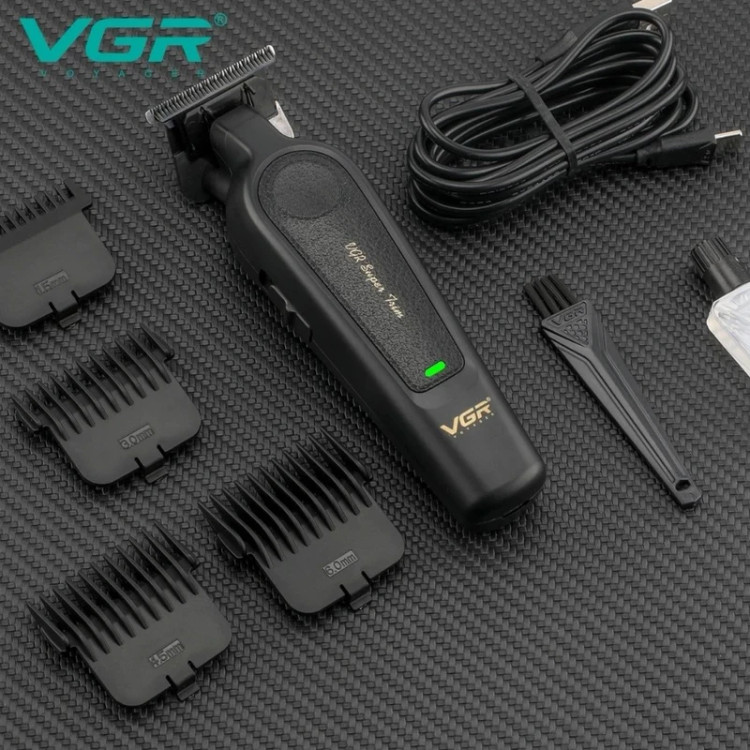 ماشین اصلاح VGR V-995 به همراه شانههای اصلاح، کابل شارژ، روغن روانکننده و برس تمیزکننده در لومینو قشم