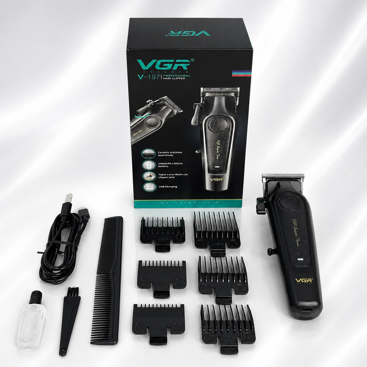 محتویات کامل جعبه ماشین اصلاح VGR V-197 شامل شانهها، کابل، روغن و برس در لومینو قشم
